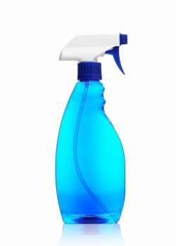 Bottle of window cleaner isolated on white. More cleaning...